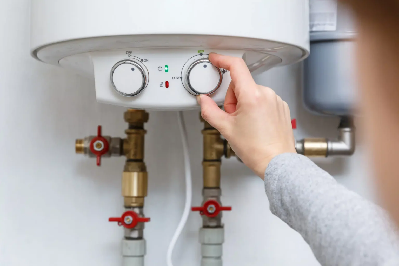 Technician adjusting a water heater in Los Gatos